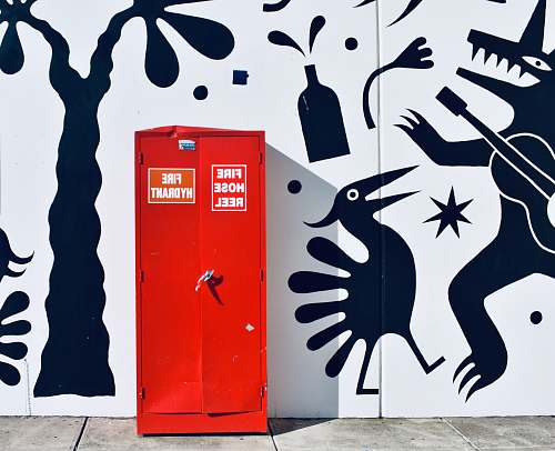 fire hydrant at preston market red metal fire hose reel box beside wall preston